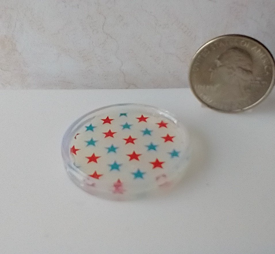 1:12 scale round serving tray faux acrylic tray with red blue stars on white background July 4th party tray REF July 4th
