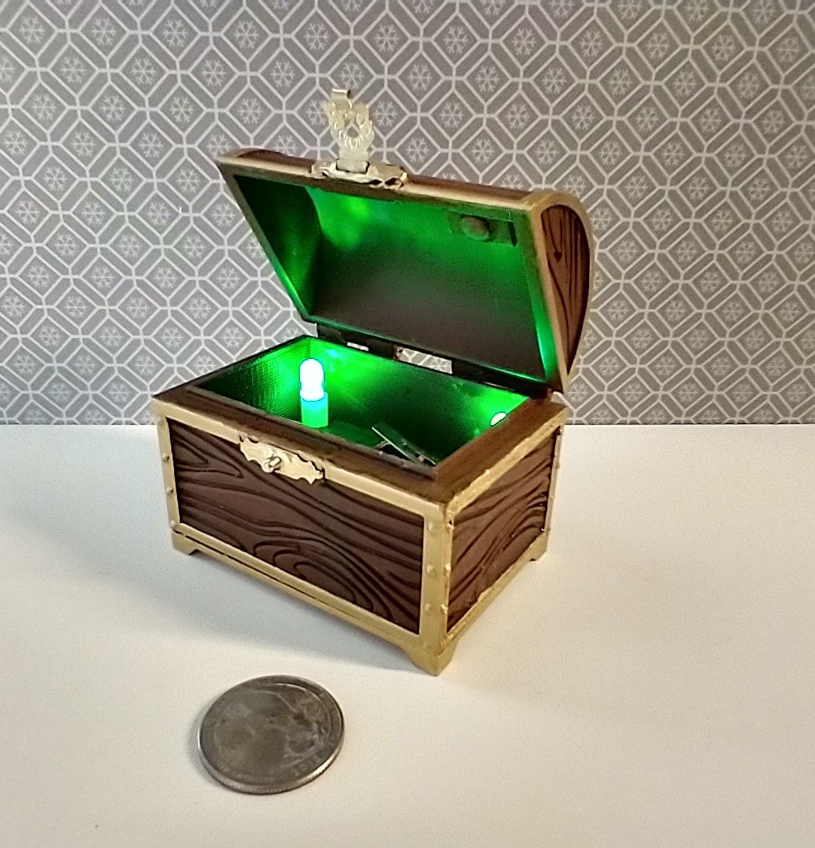 1:12 scale miniature battery lighted treasure chest in chocolate color wood grain texture lights up when lid is open