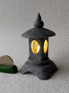 Light up faux stone garden lantern in traditional Japanese style