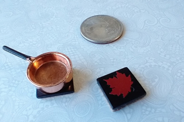 1:12 Dollhouse kitchen accessory Faux black ceramic trivet with maple leaf decal cork backing PRICE is for EACH Reference red leaf