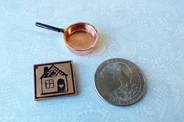 1:12 Dollhouse kitchen accessory Faux opper trivet with house image relief