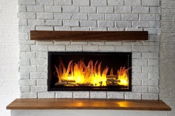 My first white brick wall fireplace with lit insert