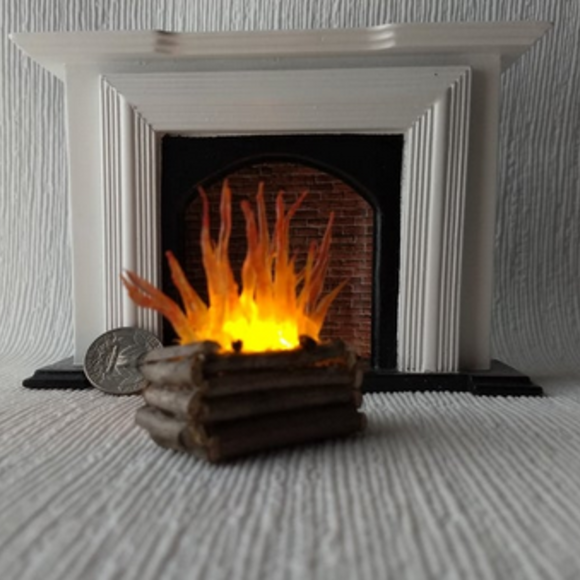 Flickering lit logs insert for your fireplace (1:12)