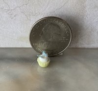 1:12 Dollhouse miniature cupcake with white cream and blue butterfly topper