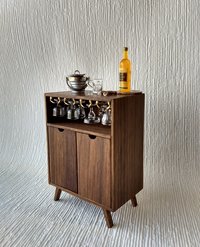 1:12 Dollhouse mid-century style bar cabinet in solid walnut with splayed legs and four wine glasses
