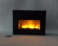 RESERVED 1:12 Dollhouse modern fireplace Free standing black fireplace battery operated with flickering insert that is removable comes with two AAA batteries
