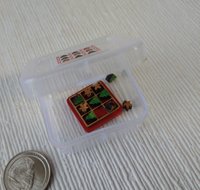1:12 dollhouse holiday tic tac toe in wood tray Miniature tic tac toy with Christmas trees and gingerbread men cutouts Price is for each set