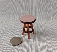 1:12 Dollhouse bath stool with pink laminate seat and solid cherry legs