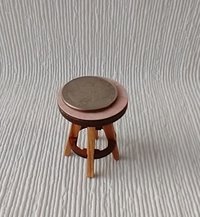 1:12 Dollhouse bath stool with pink laminate seat and solid cherry legs
