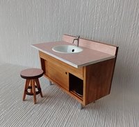 1:12 Dollhouse bath stool with pink laminate seat and solid cherry legs