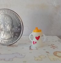 1:12 Dollhouse miniature sippy cup with easy grip handles giraffe and hearts decals REF Orange lid