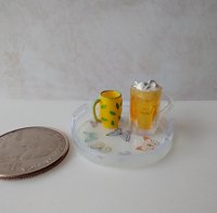 1:12 scale round serving tray faux acrylic tray with butterflies on white background