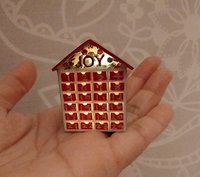 1:12 Dollhouse light up advent calendar with JOY sign above the twenty-four openable drawers Battery operated miniature holiday LEDs decor No external wires