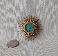 1:12 Dollhouse sunburst wall clock with 28 rays in golden finish Mid-century patterned green clock face Non-working clock