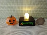 Battery lighted miniature faux glass Jack-o-Lantern Pumpkin light on black stand Halloween light for 1-inch scale or play scale