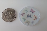 1:12 scale round serving tray faux acrylic tray with butterflies on white background