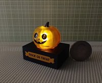 Battery lighted miniature faux glass Jack-o-Lantern Pumpkin light on black stand Halloween light for 1-inch scale or play scale