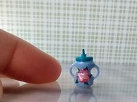Dollhouse miniature holiday-themed sippy cup with easy grip handles REF Teal lid, poinsettia, stocking