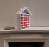 1:12 Dollhouse advent calendar with JOY sign above the twenty-four openable drawers REF Mere JOY