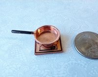 1:12 Dollhouse kitchen accessory Faux opper trivet with house image relief