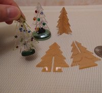 1:12 scale clear acrylic Christmas tree kit - two laser cut tree shapes to be put together to form a 3D tree Price is for EACH set Embellishments not included