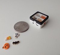 1:12 scale miniature gift boxed Halloween cookies 16 assorted pumpkins skulls candy corn and bats in box with dividers and clear window REF White base