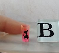 1:12 Dollhouse miniature MCM themed tumbler with atomic cat and boomerang decals REF B