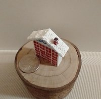 1:12 Dollhouse advent calendar with JOY sign above the twenty-four openable drawers REF Mere JOY