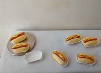 1:12 Dollhouse handcrafted hotdog and bun with mustard in paper plate marked "hotdog" so your mini friend knows what s/he will be eating Price is for ONE unit