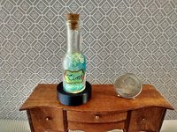 Dollhouse miniature battery lighted glass bottle blue glitter bubbles and "Time" tag inside bottle for 12th or play scale dioramas No external wires