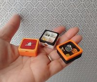 1:12 scale miniature gift boxed Halloween cookies 16 assorted pumpkins skulls candy corn and bats in box with dividers and clear window REF White base