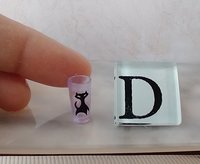 1:12 Dollhouse miniature MCM themed tumbler with atomic cat and boomerang decals REF D