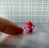 Dollhouse miniature holiday-themed sippy cup with easy grip handles REF Pink body, Christmas ornament, holly