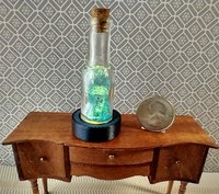 Dollhouse miniature battery lighted glass bottle blue glitter bubbles and "Time" tag inside bottle for 12th or play scale dioramas No external wires