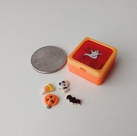 1:12 scale miniature gift boxed Halloween cookies 16 assorted pumpkins skulls candy corn and bats in box with dividers and clear window REF Orange base