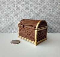 1:12 scale miniature battery lighted treasure chest in chocolate color wood grain texture lights up when lid is open