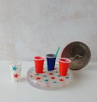 1:12 scale round serving tray faux acrylic tray with red blue stars on white background July 4th party tray REF July 4th