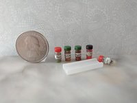 1:12 dollhouse miniature set of five spice jars in frosted acrylic rack REF 1 black lid