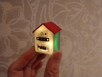 1:12 Dollhouse light up advent calendar with JOY sign above the twenty-four openable drawers Battery operated miniature holiday LEDs decor No external wires