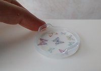 1:12 scale round serving tray faux acrylic tray with butterflies on white background