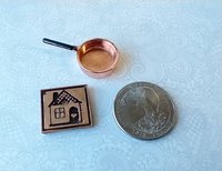 1:12 Dollhouse kitchen accessory Faux opper trivet with house image relief
