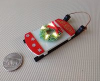 1:12 scale dollhouse wooden sled with green wreath Battery lighted Happy Holidays sign REF Lighted wreath