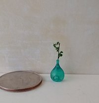 1:12 miniature tear drop shaped flower vase in transparent blue comes with green plant