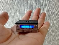 1:12 scale dollhouse audio amplifier with battery operated blue LED light