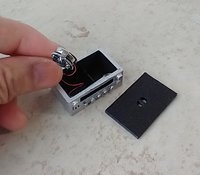 1:12 scale dollhouse audio amplifier with battery operated blue LED light