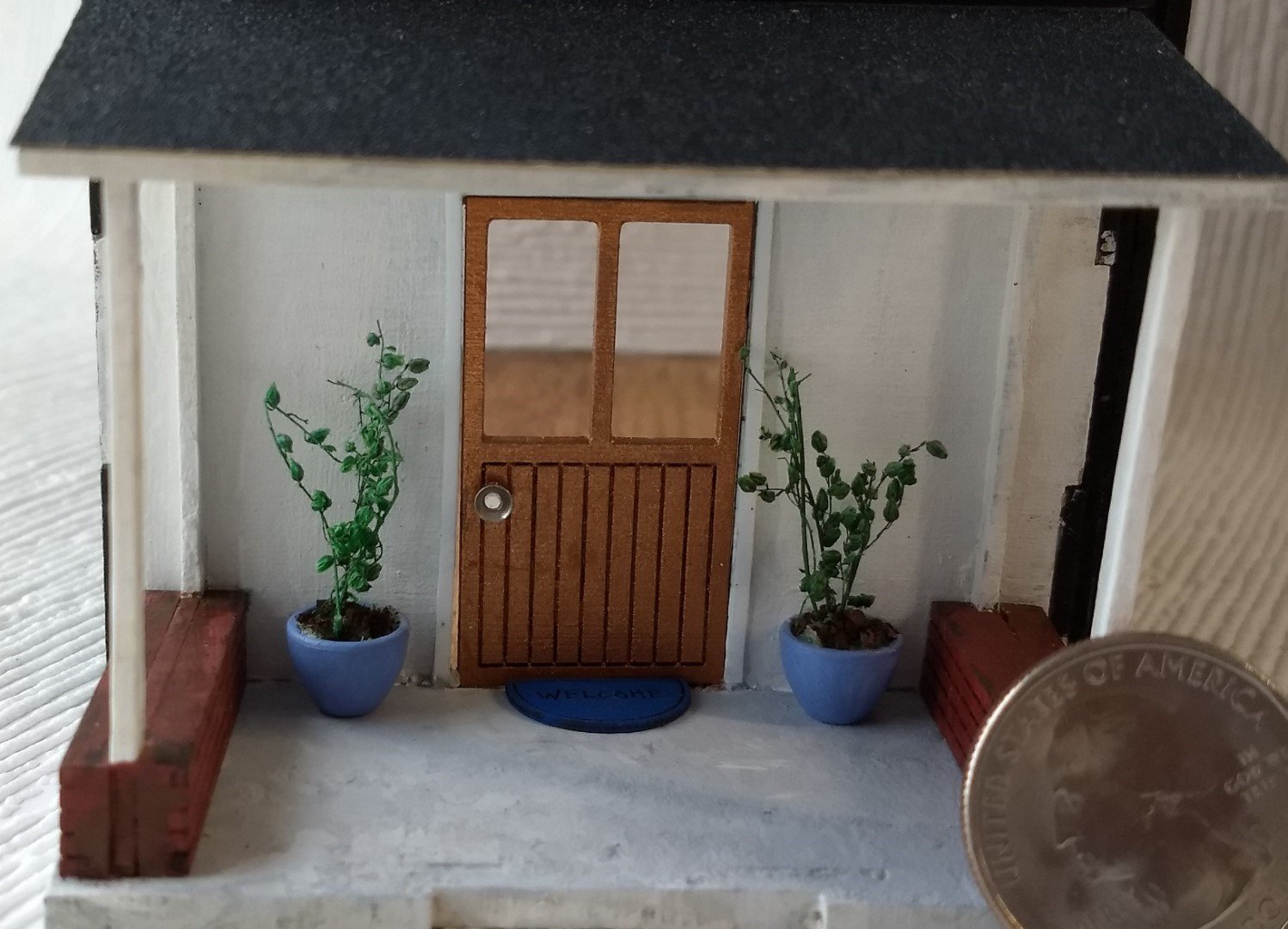 Quarter scale 1:48 modern dollhouse with five ceiling lights complete flooring wall papering 2 planters and welcome door mat