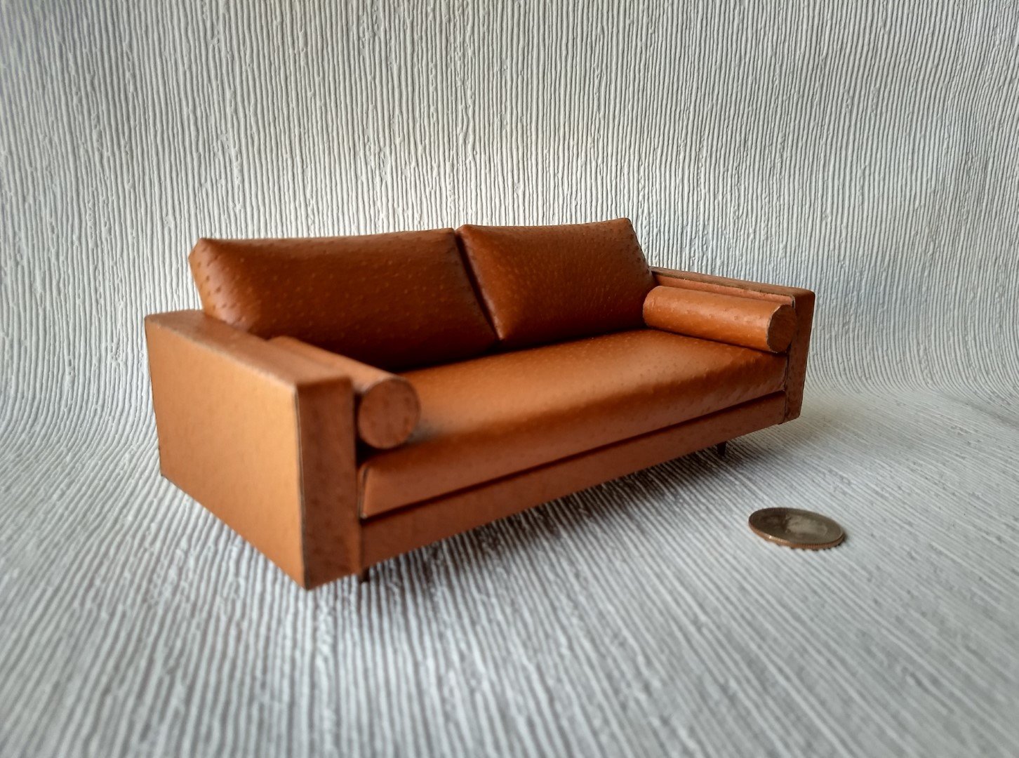 1:12 Dollhouse miniature mid-century style leather sofa in burnt orange color with tapered walnut legs