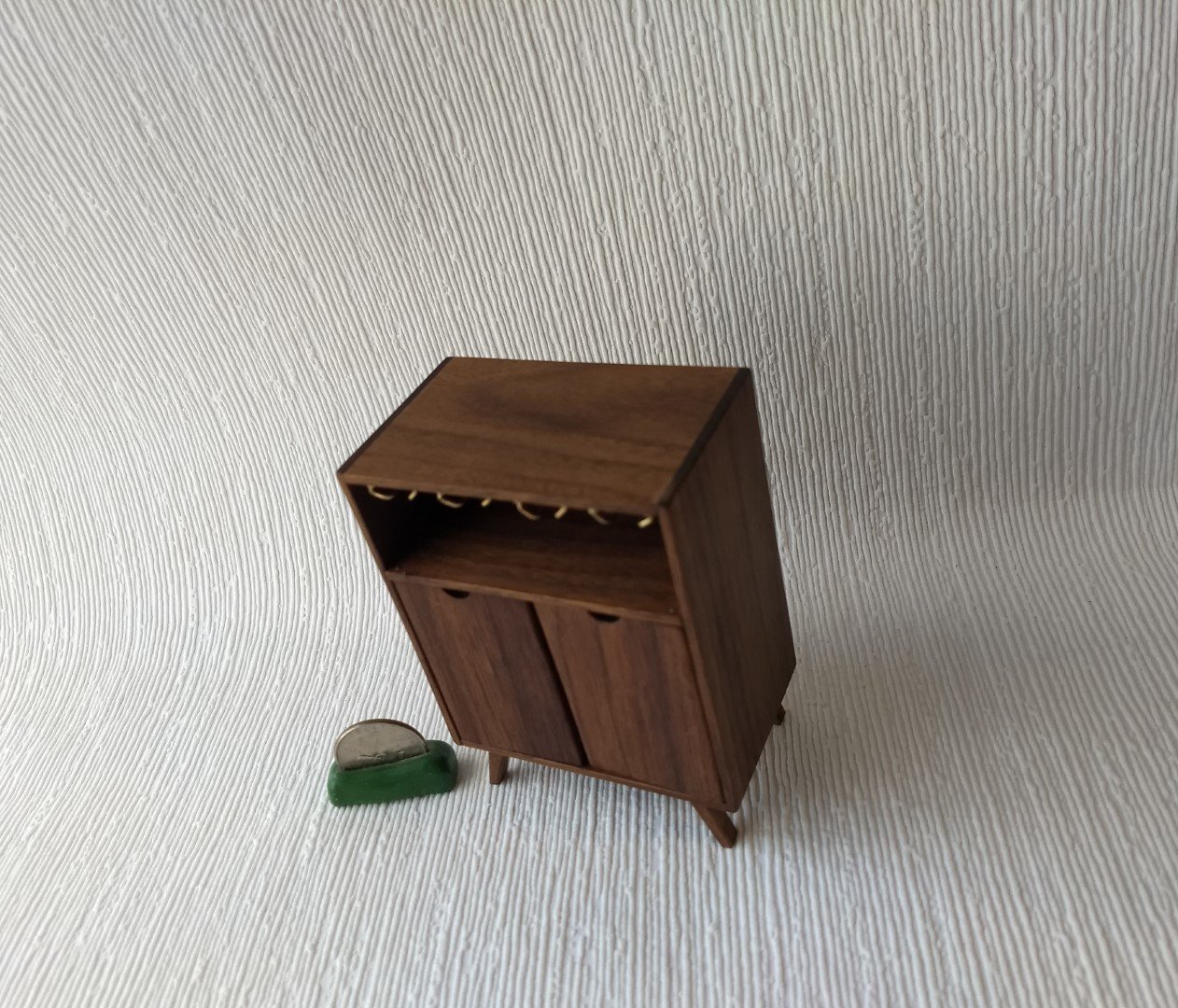 1:12 Dollhouse mid-century style bar cabinet in solid walnut with splayed legs and four wine glasses