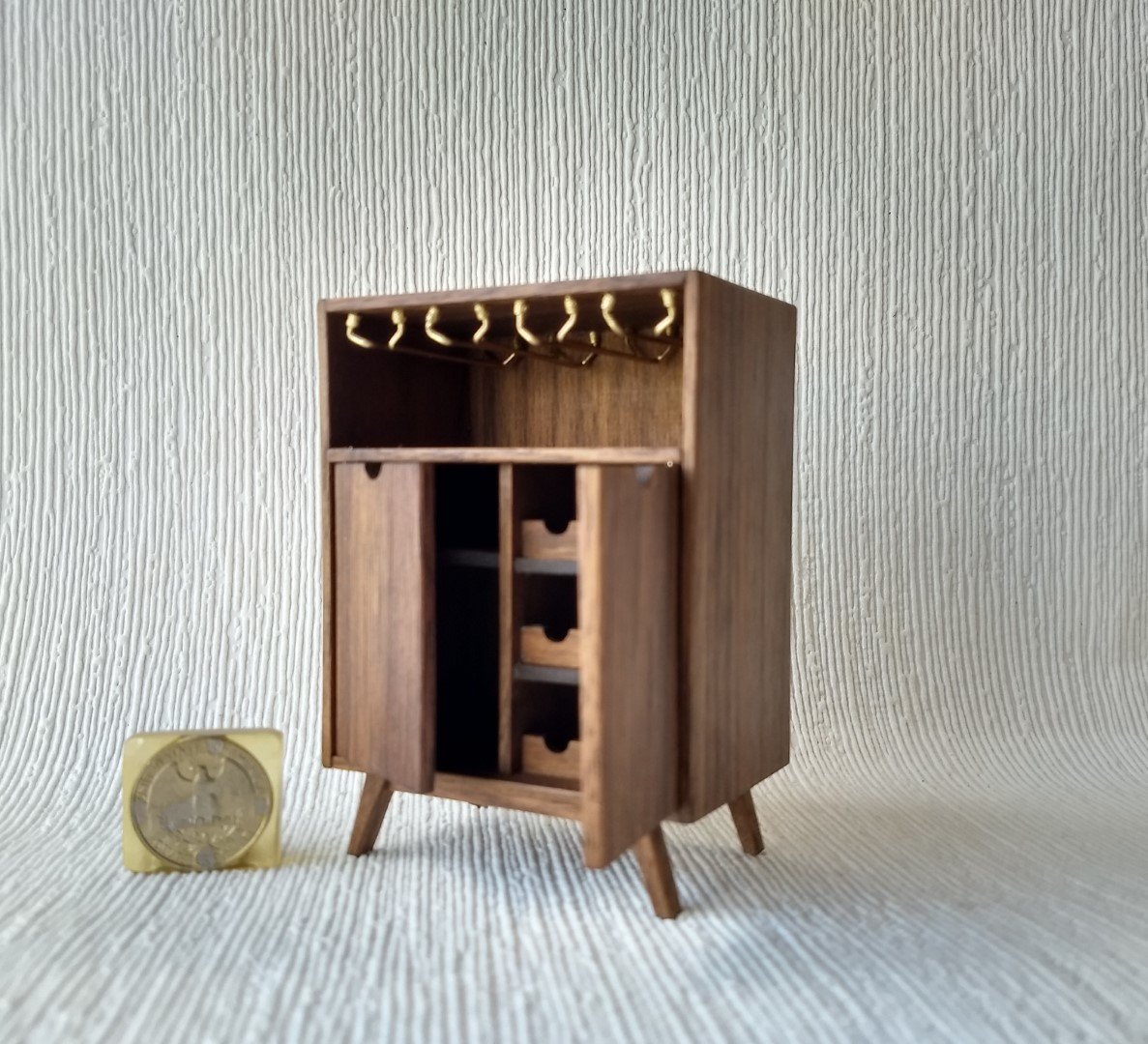 1:12 Dollhouse mid-century style bar cabinet in solid walnut with splayed legs and four wine glasses