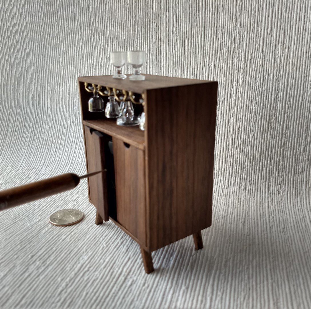 1:12 Dollhouse mid-century style bar cabinet in solid walnut with splayed legs and four wine glasses